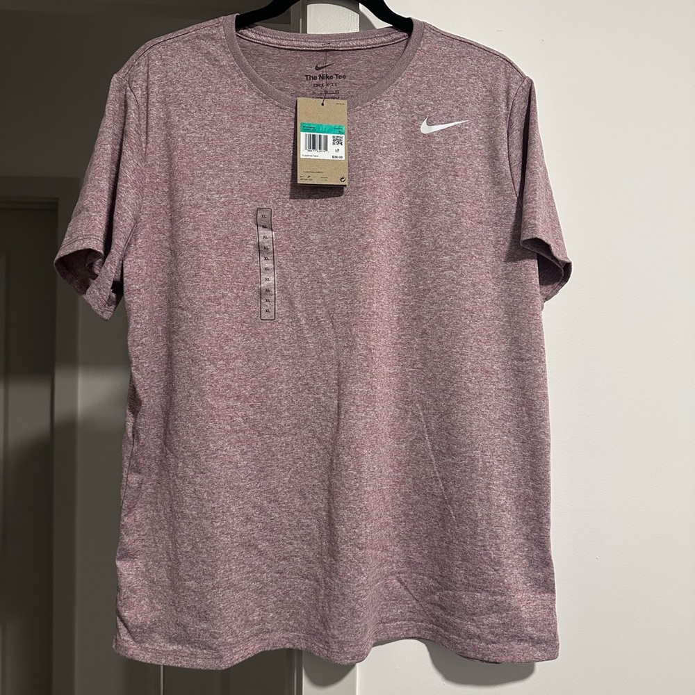 Woman’s Nike XL heathered pink Dri Fit Shirt